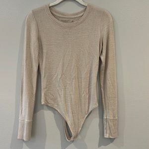 Extremely soft tan bodysuit